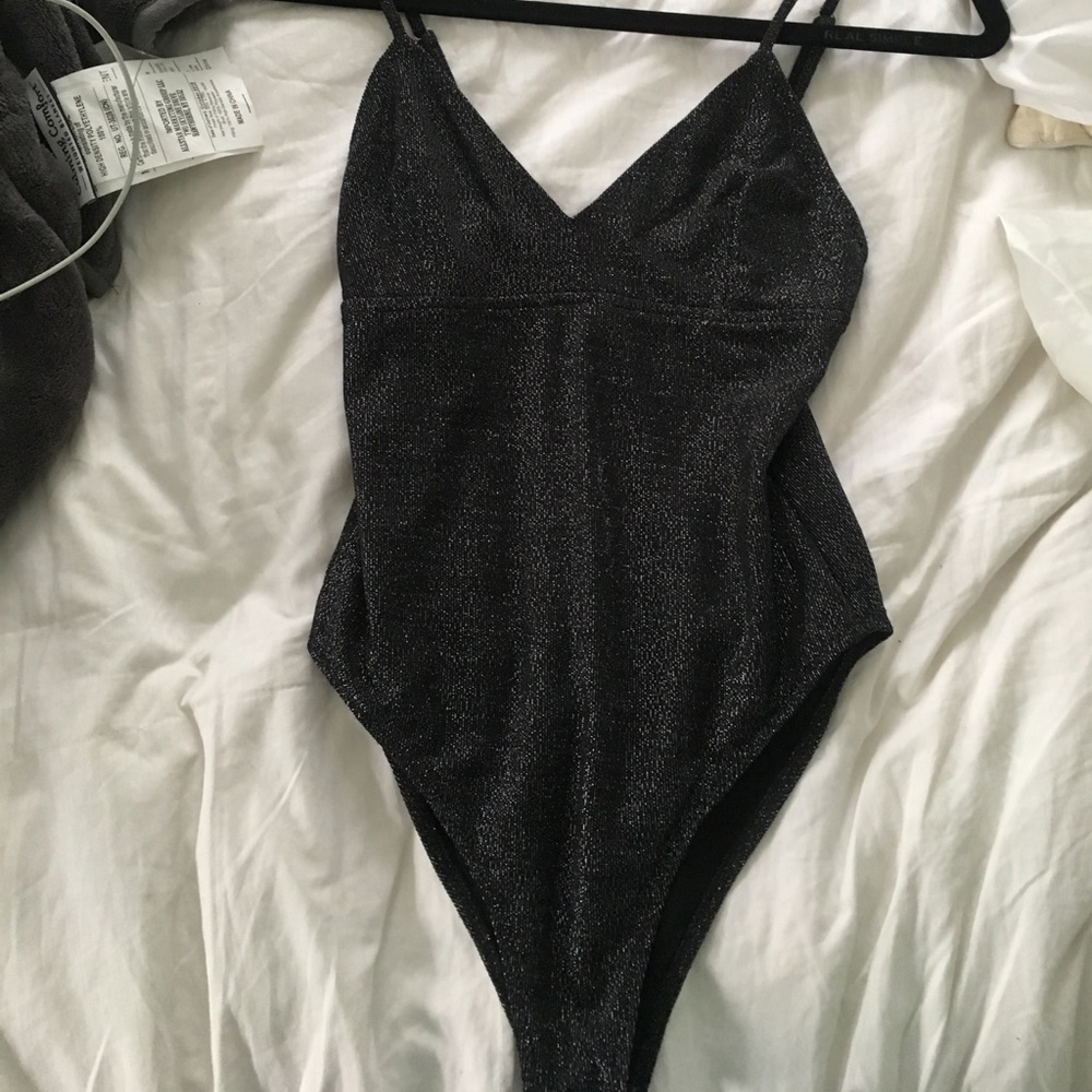 Shimmery metallic body suit
